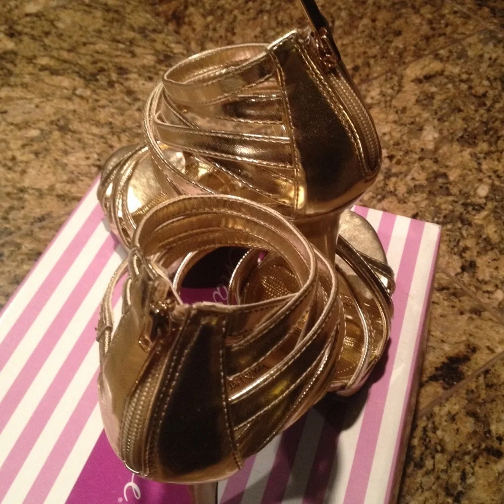 Gold strappy Charlotte Russe heels/sandal